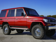 1991 JT1V0LJ7708000216 Medium Red Pearl - Outdoors